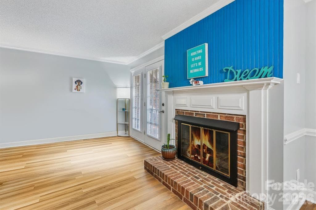 The main floor features beautiful luxury vinyl plank flooring throughout with no carpet, offering a stylish, durable, and low-maintenance living space that complements any décor - Monroe