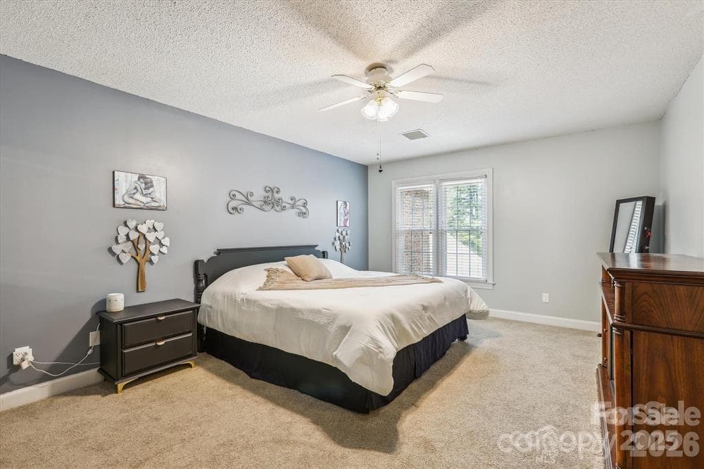 Huge primary suite upstairs. This fabulous retreat has an en-suite full bathroom and walk-in closet with additional storage that can easily be converted into a second closet - 806 Colony Oaks Drive, Monroe