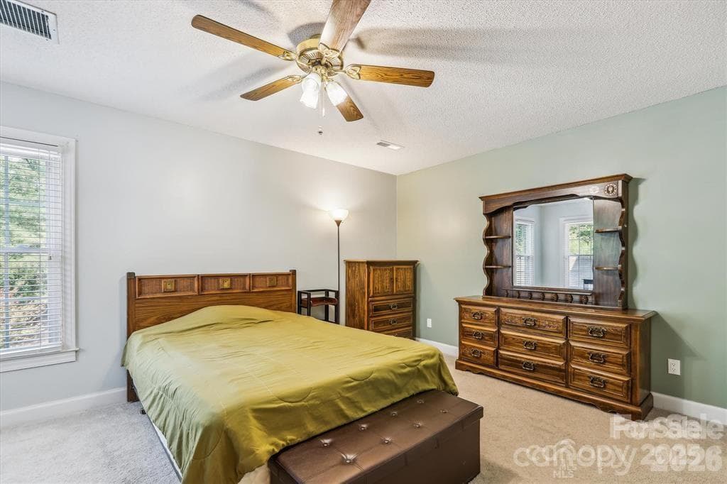 Second oversized bedroom upstairs with access to a private bathroom - 806 Colony Oaks Drive, Monroe