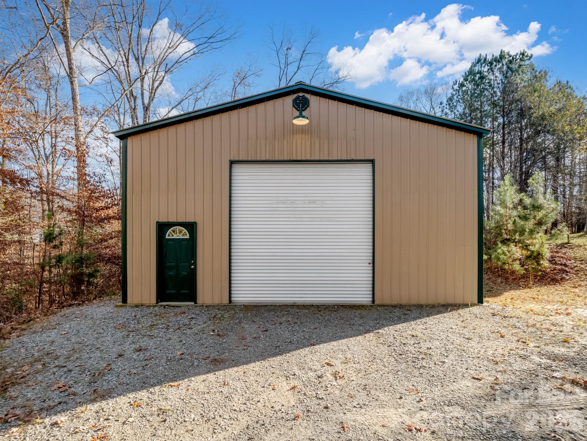 With 1,678 sq. ft., the detached garage easily accommodates recreational vehicles and water toys, keeping them safe and ready for adventure - 1090 N Saunders Drive, Catawba