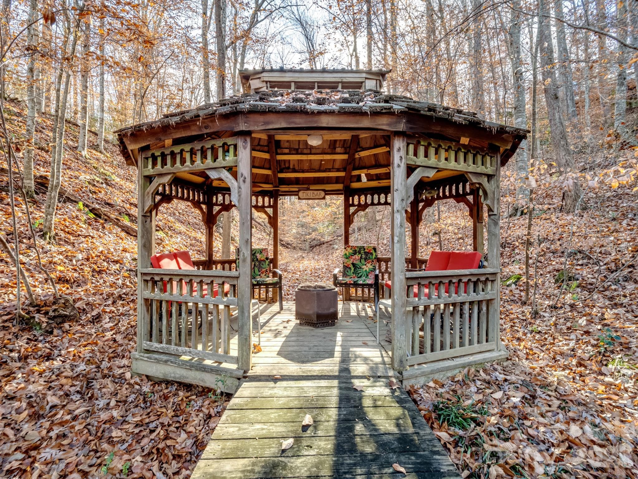 Charming gazebo surrounded by natural landscaping, offering a peaceful retreat. - 1090 N Saunders Drive, Catawba