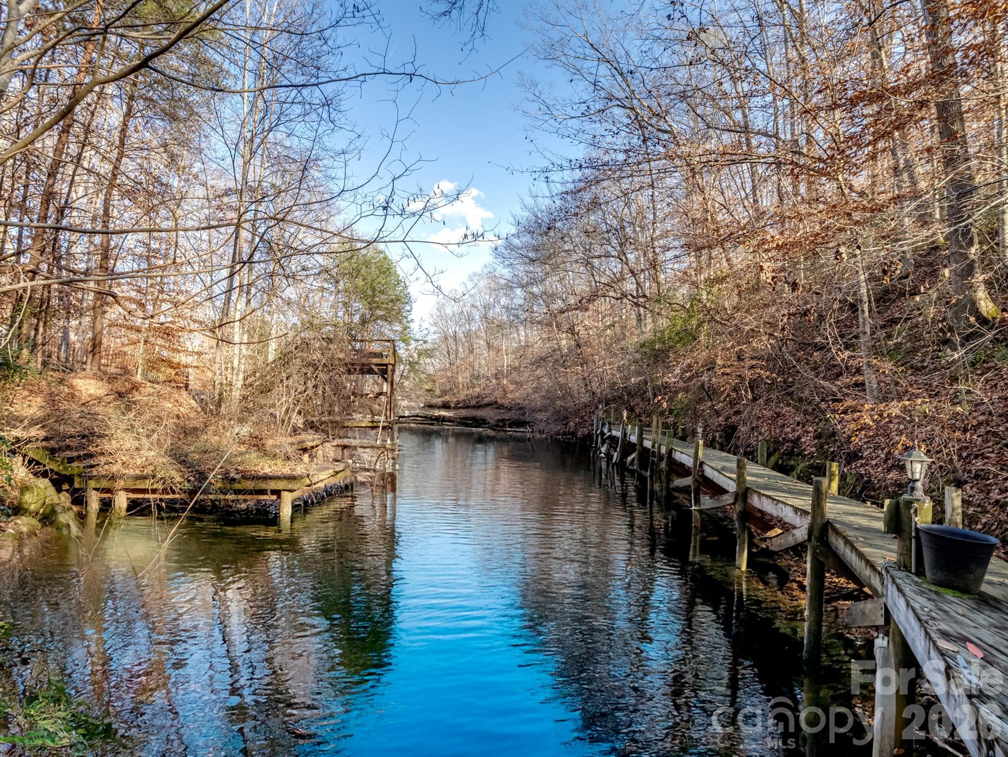 The illuminated boardwalk offers a convenient spot to dock your watercraft and a perfect place to enjoy the fresh country air. - 1090 N Saunders Drive, Catawba