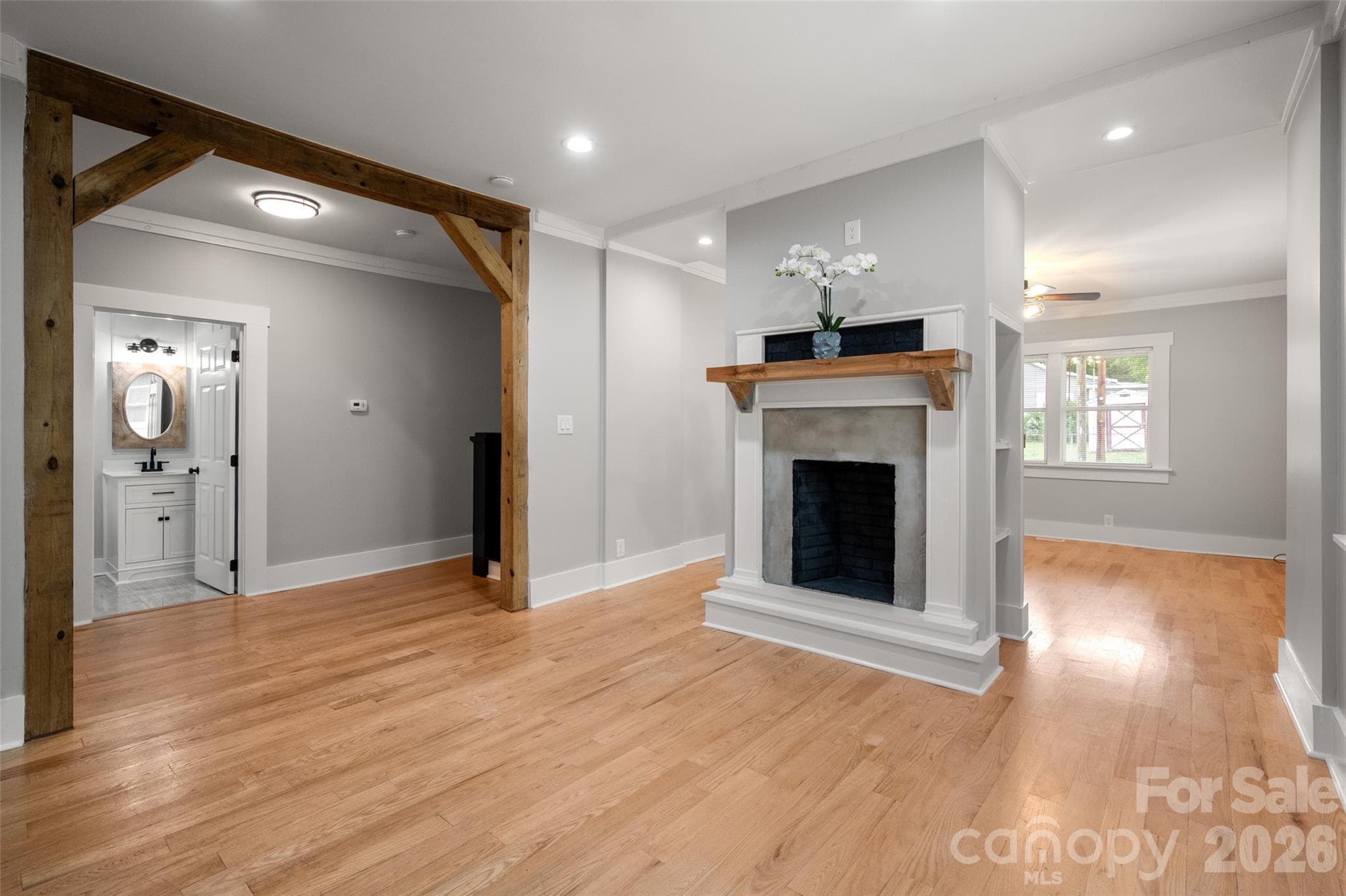 Double sided fireplace in the dining room - 174 Tournament Drive SW, Concord