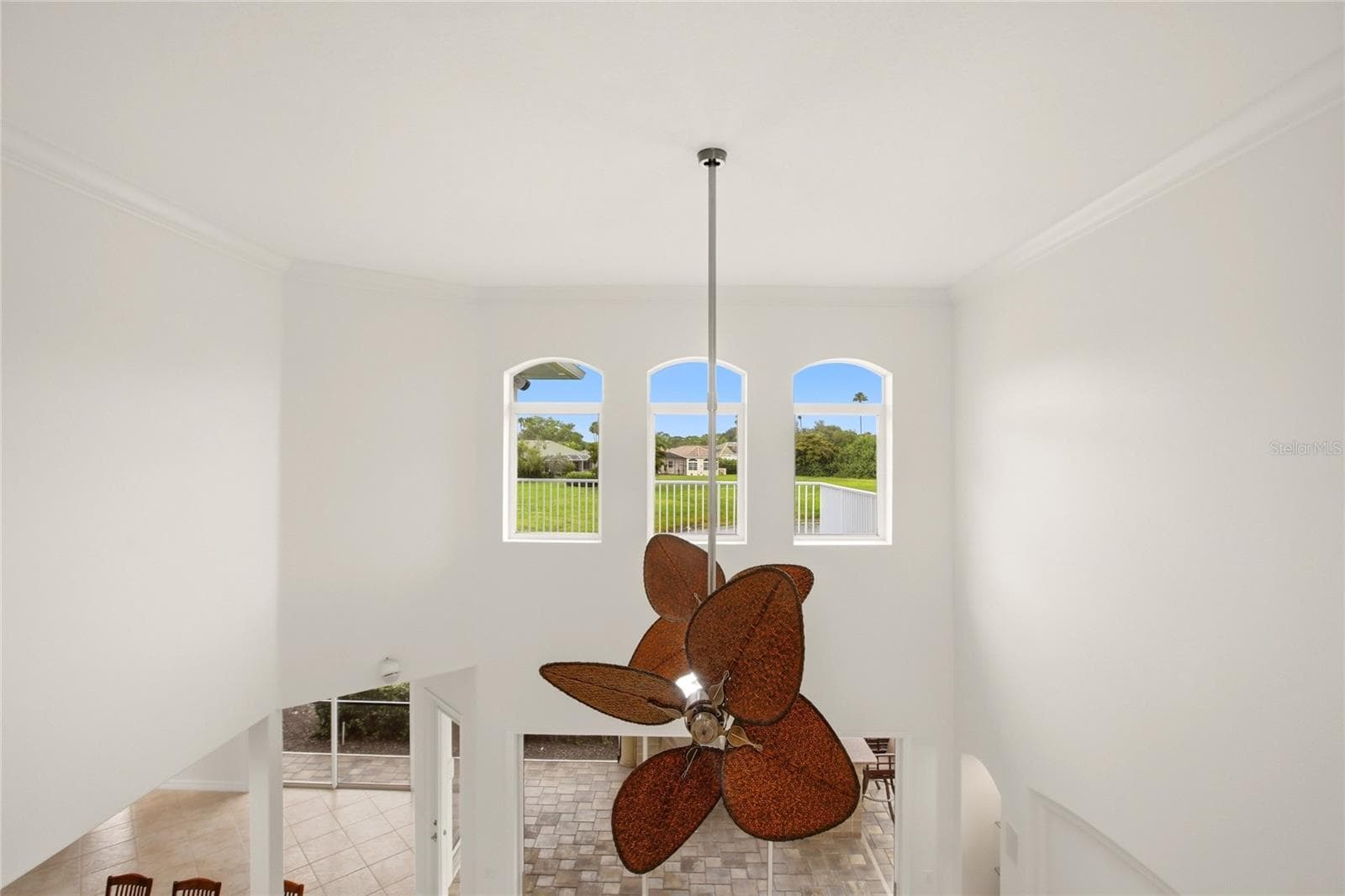 View of the lake and Misty Creek nature from the upstairs catwalk. - 8417 LONE EAGLE WAY, SARASOTA