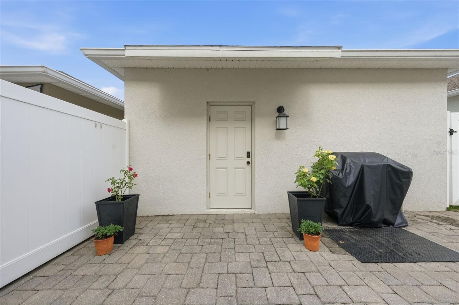 Exterior door to garage - 11025 SUSPENSE DR, WINTER GARDEN