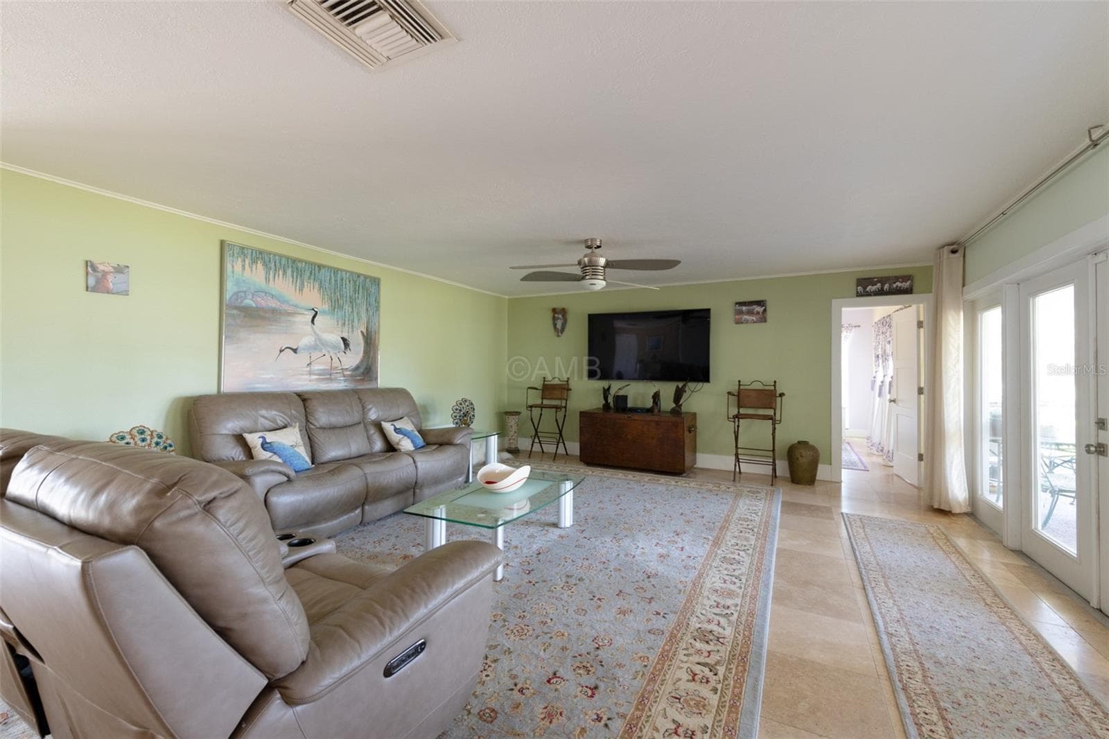Living room has incredible view to lanai and waterway! - 11580 W DIXIE SHORES DR, CRYSTAL RIVER