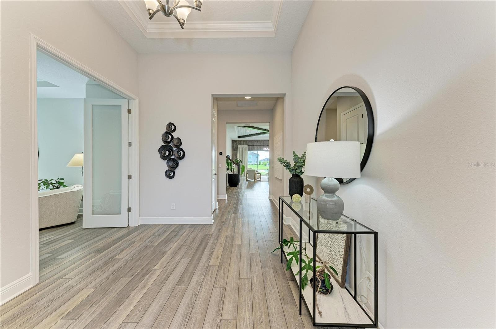 Welcoming foyer showcasing elegant finishes - 17725 ROOST PL, LAKEWOOD RANCH