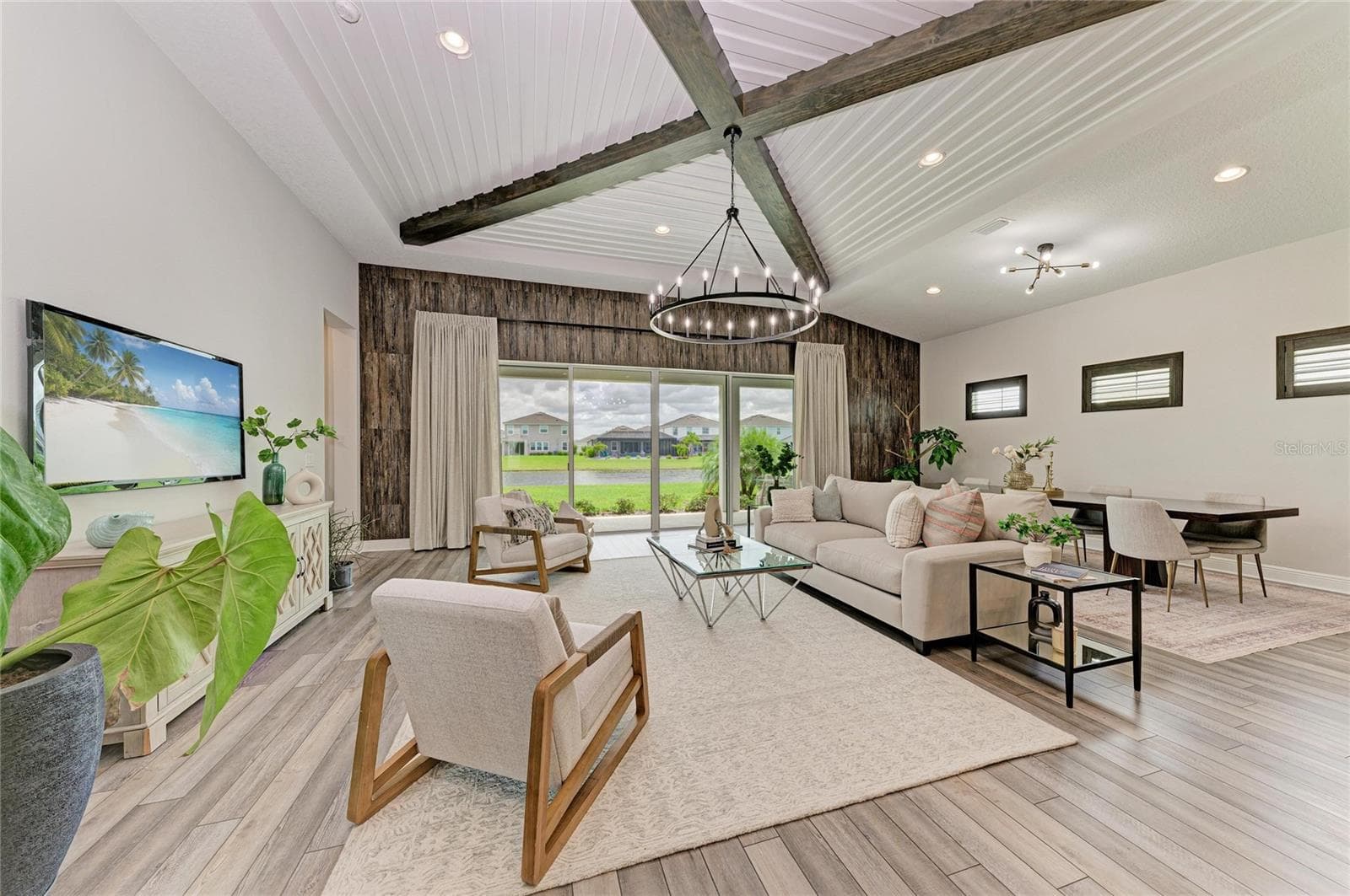 Designer lighting, and soaring ceilings - 17725 ROOST PL, LAKEWOOD RANCH