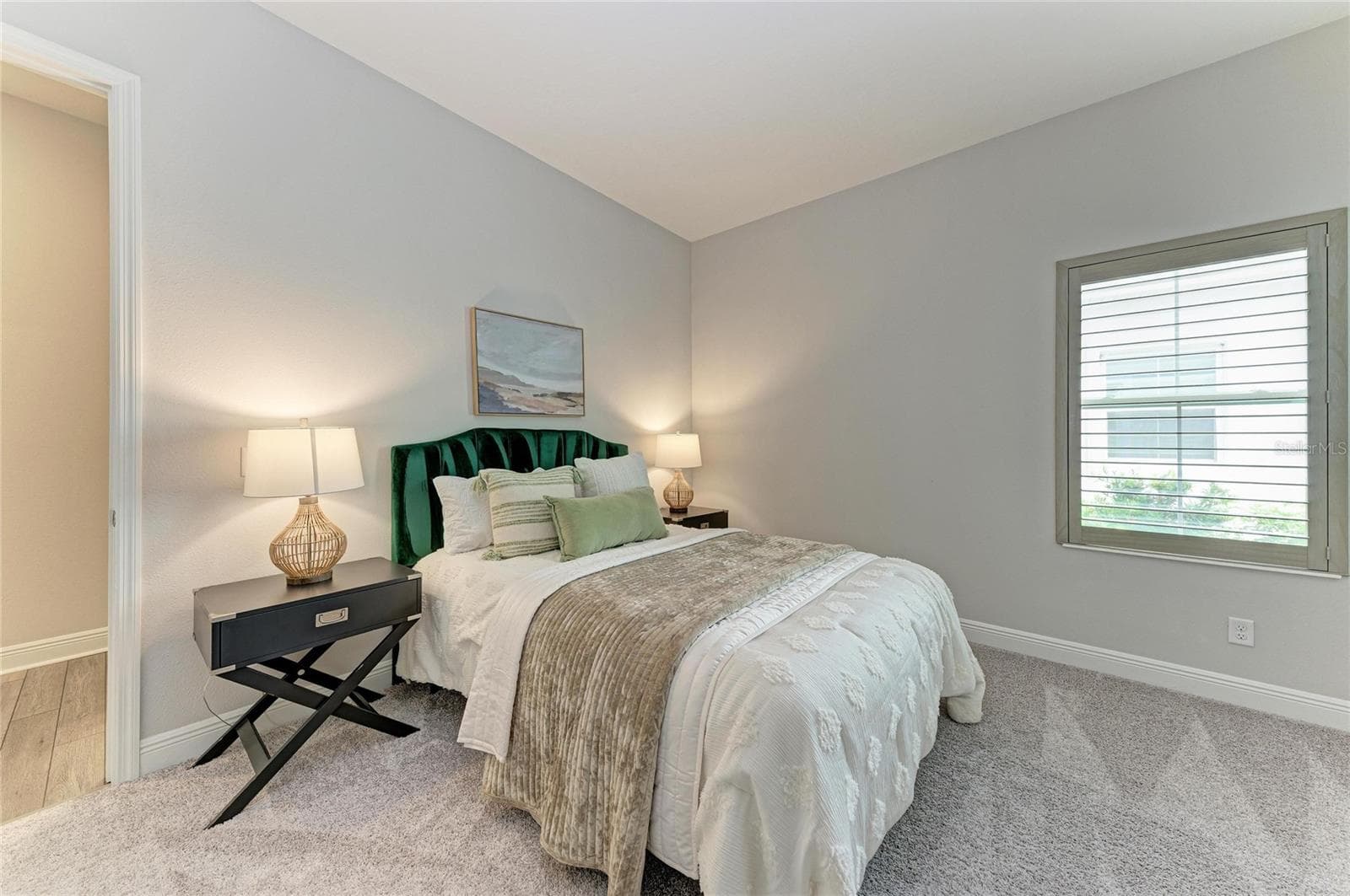 Spacious secondary bedroom offering privacy and versatility - 17725 ROOST PL, LAKEWOOD RANCH