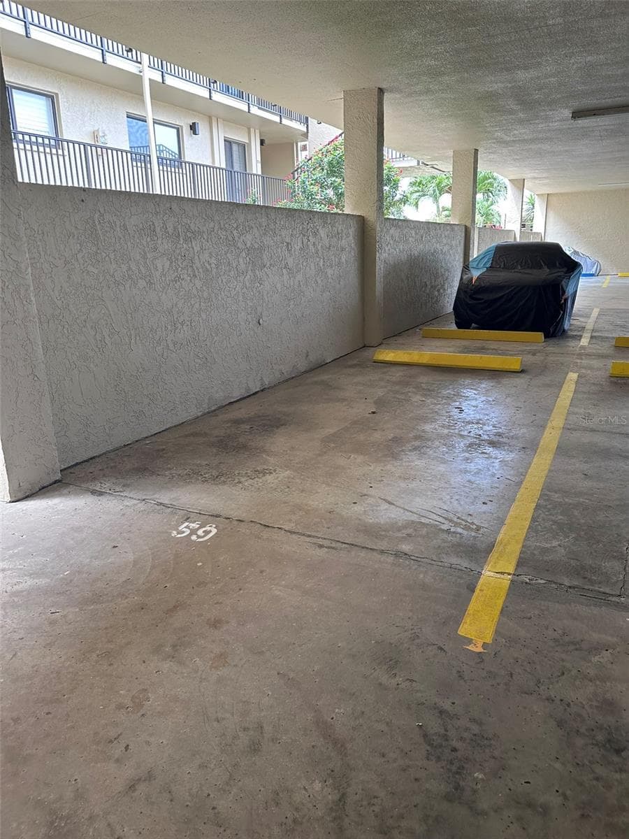 Covered assigned parking garage space - 6322 PALMA DEL MAR BLVD S #G402, ST PETERSBURG