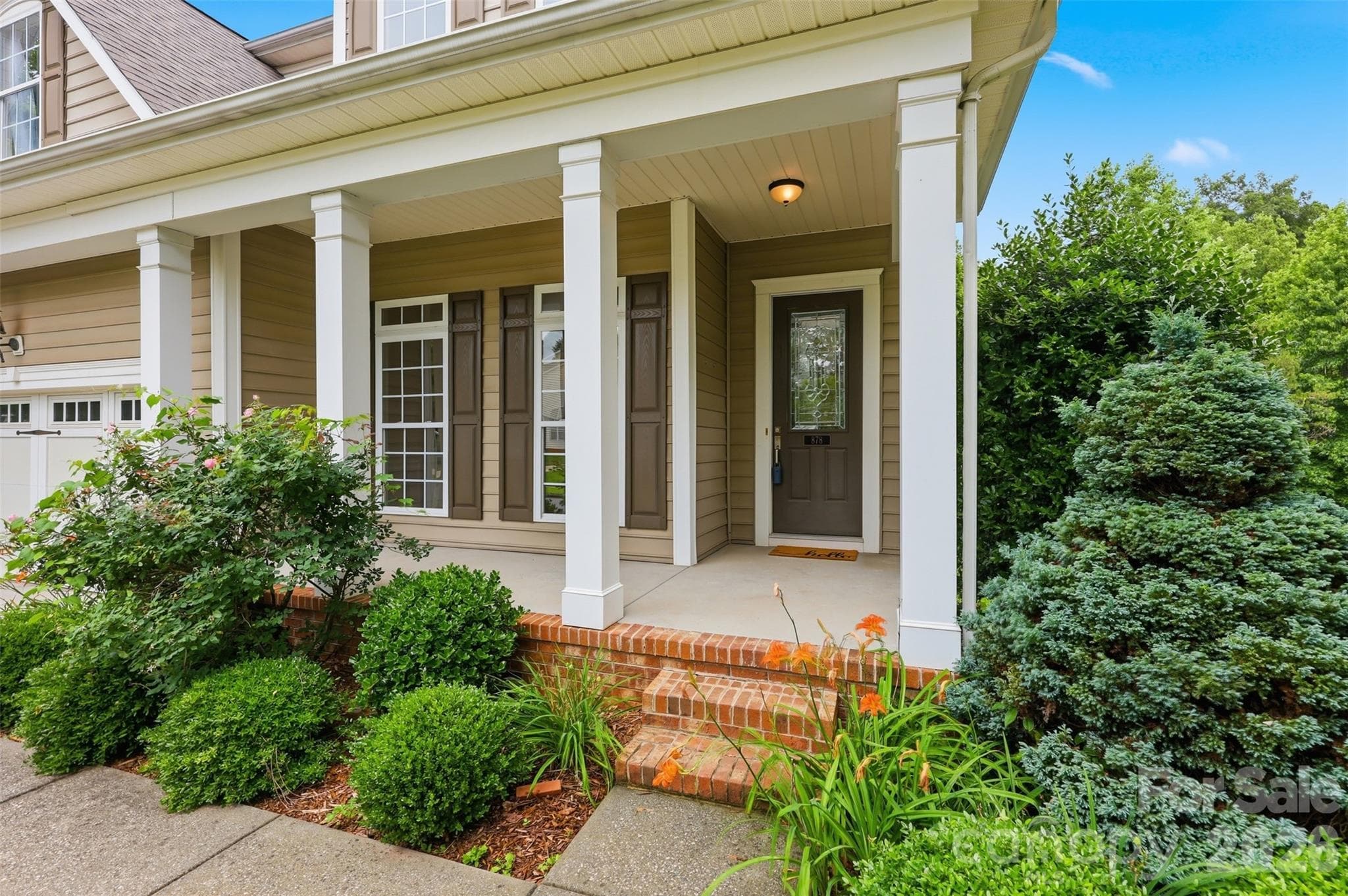 Enjoy a sweet tea on your front porch - 878 Treasure Court, Fort Mill