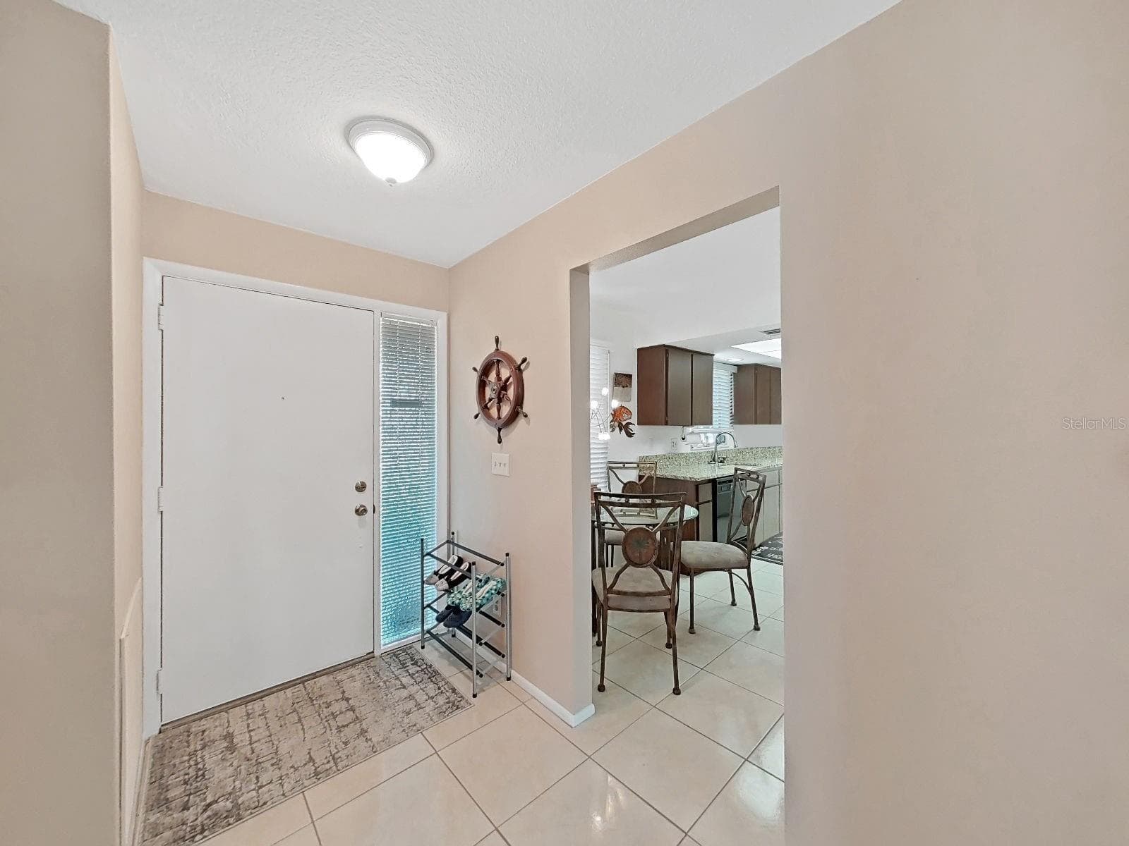 Front entrance and kitchen - 2819 THISTLE CT S, PALM HARBOR