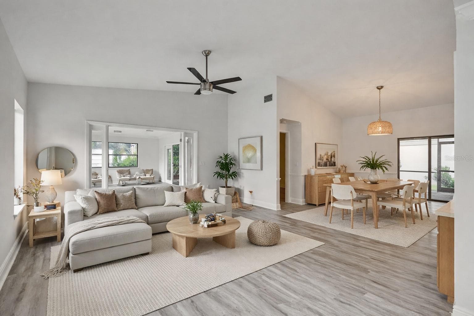 Great room and dinning room digitally enhanced - 7861 PINE TRACE DR #7861, SARASOTA