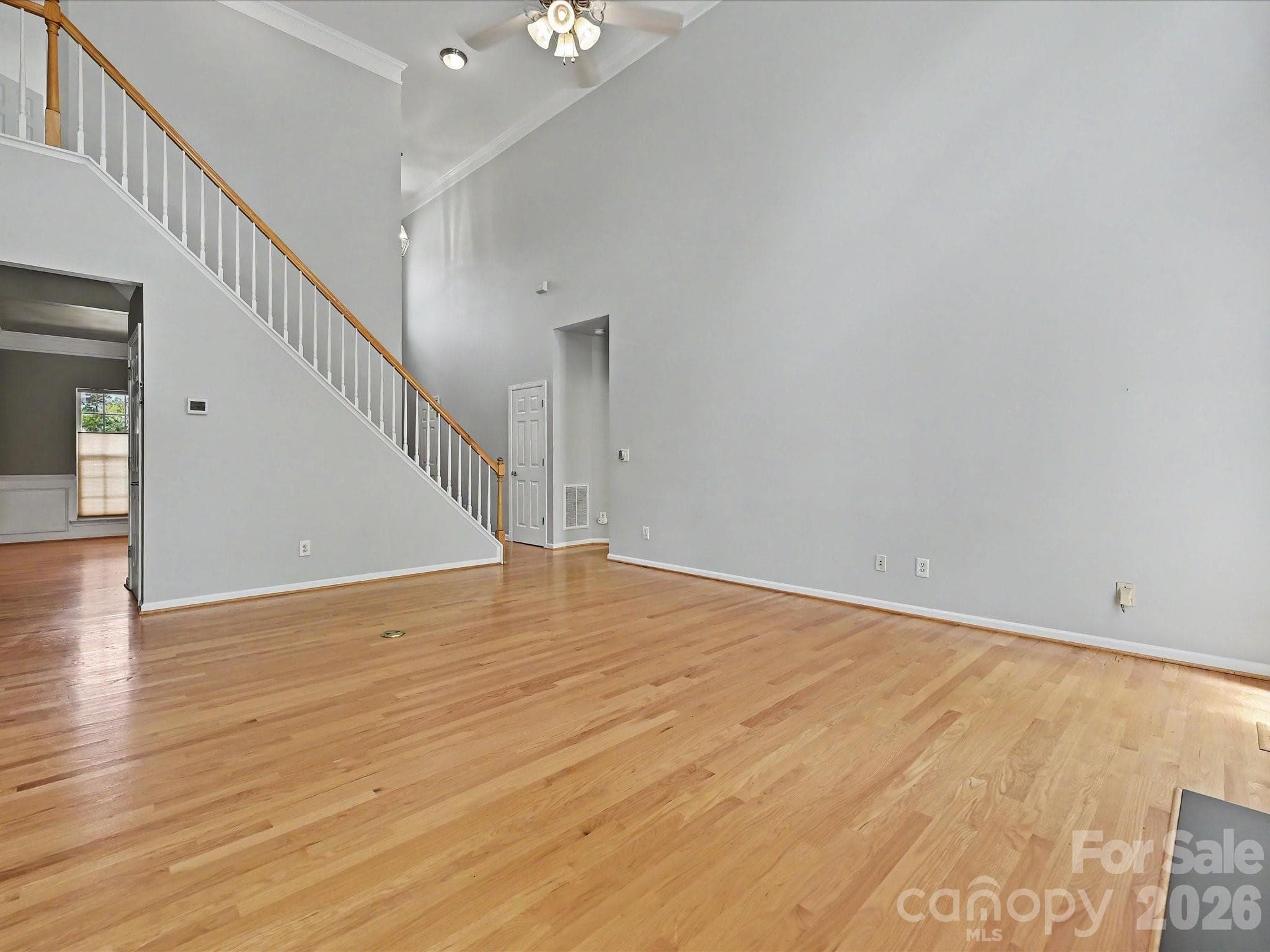 Great room with hardwoods, ceiling fan, fireplace - Mount Holly