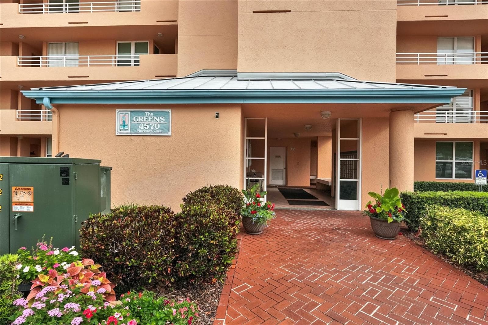 Entry to elevator - 4570 PINEBROOK CIRCLE CIR #404, BRADENTON