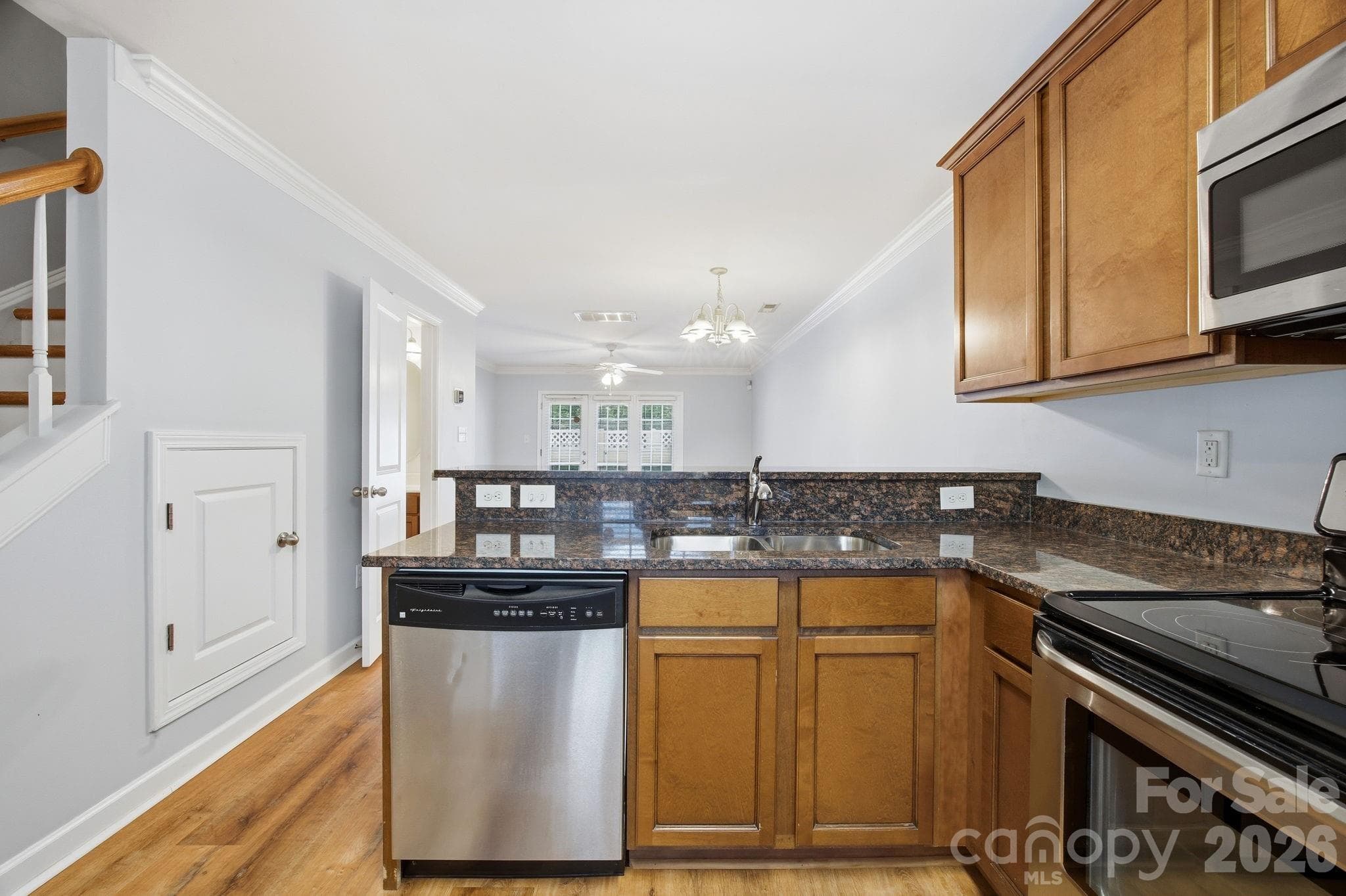 Kitchen breakfast bar overlooks dining & living - 1215 Green Oaks Lane, Charlotte