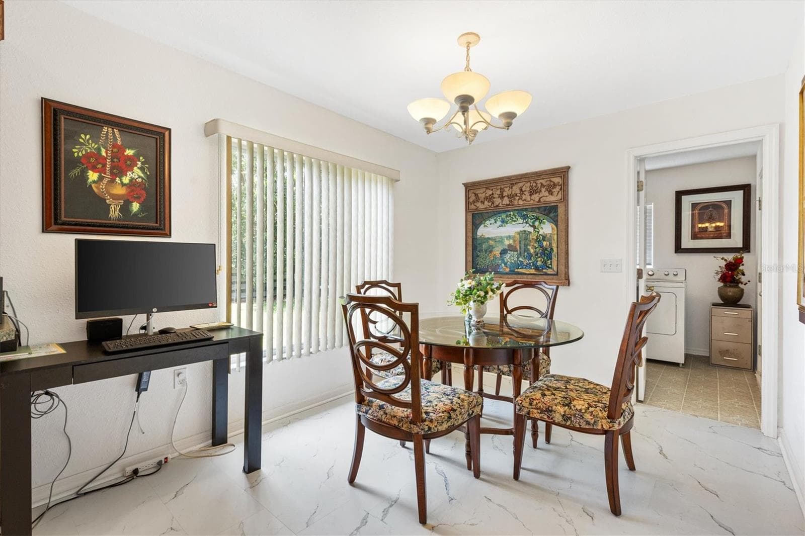 Eat-in breakfast nook in kitchen, laundry room through doorway - 9498 SE 174TH LOOP, SUMMERFIELD
