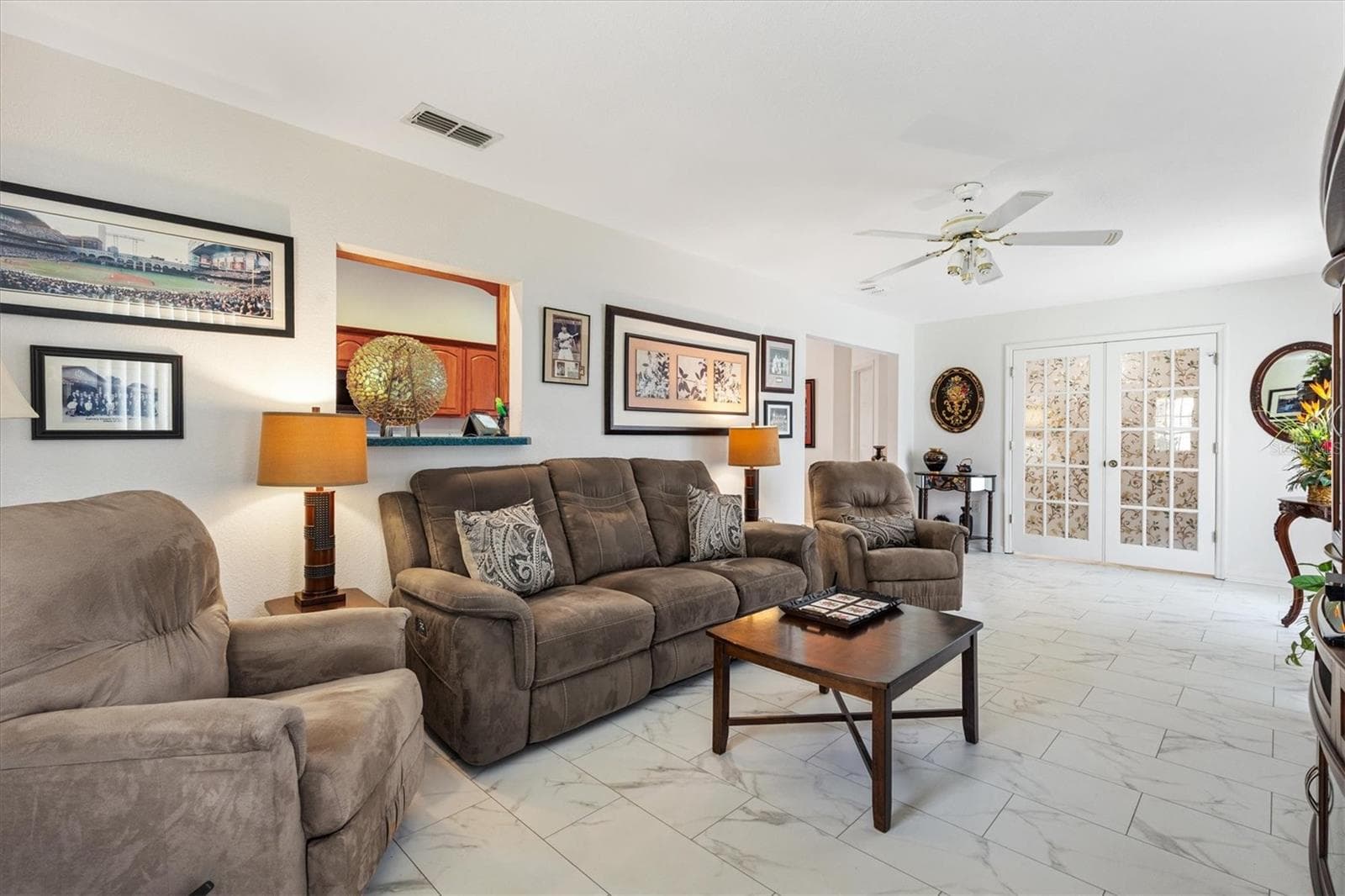 Closed French door leads to Primary en-suite - 9498 SE 174TH LOOP, SUMMERFIELD