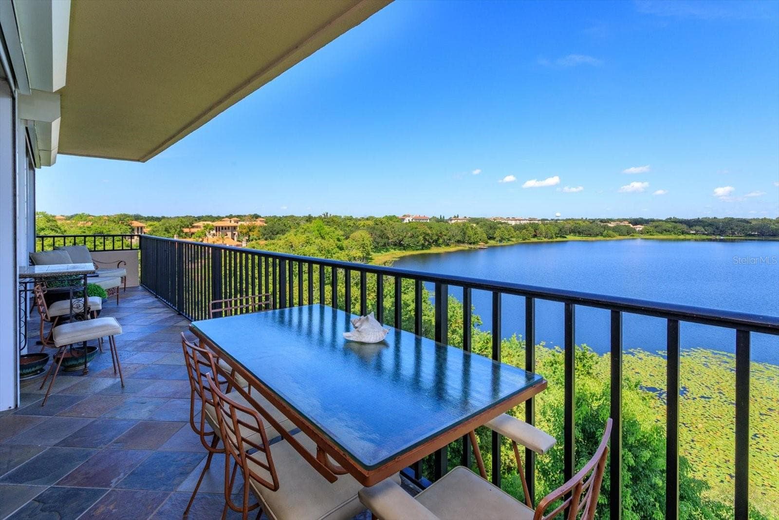 living area view from balcony - 7550 HINSON ST #6A, ORLANDO