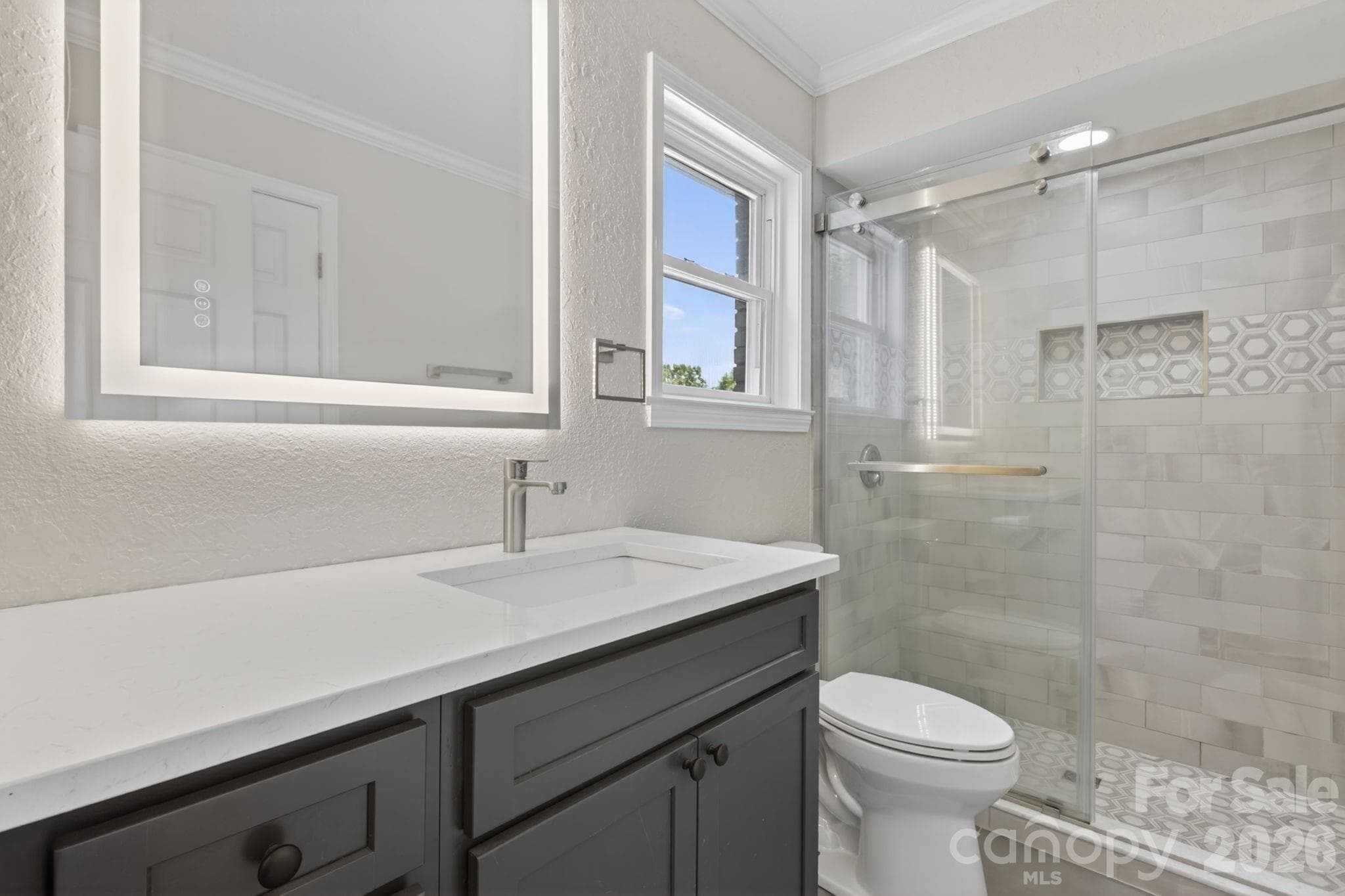Primary bathroom with custom tile shower and new vanity - 97 Whippoorwill Lane, Fairview
