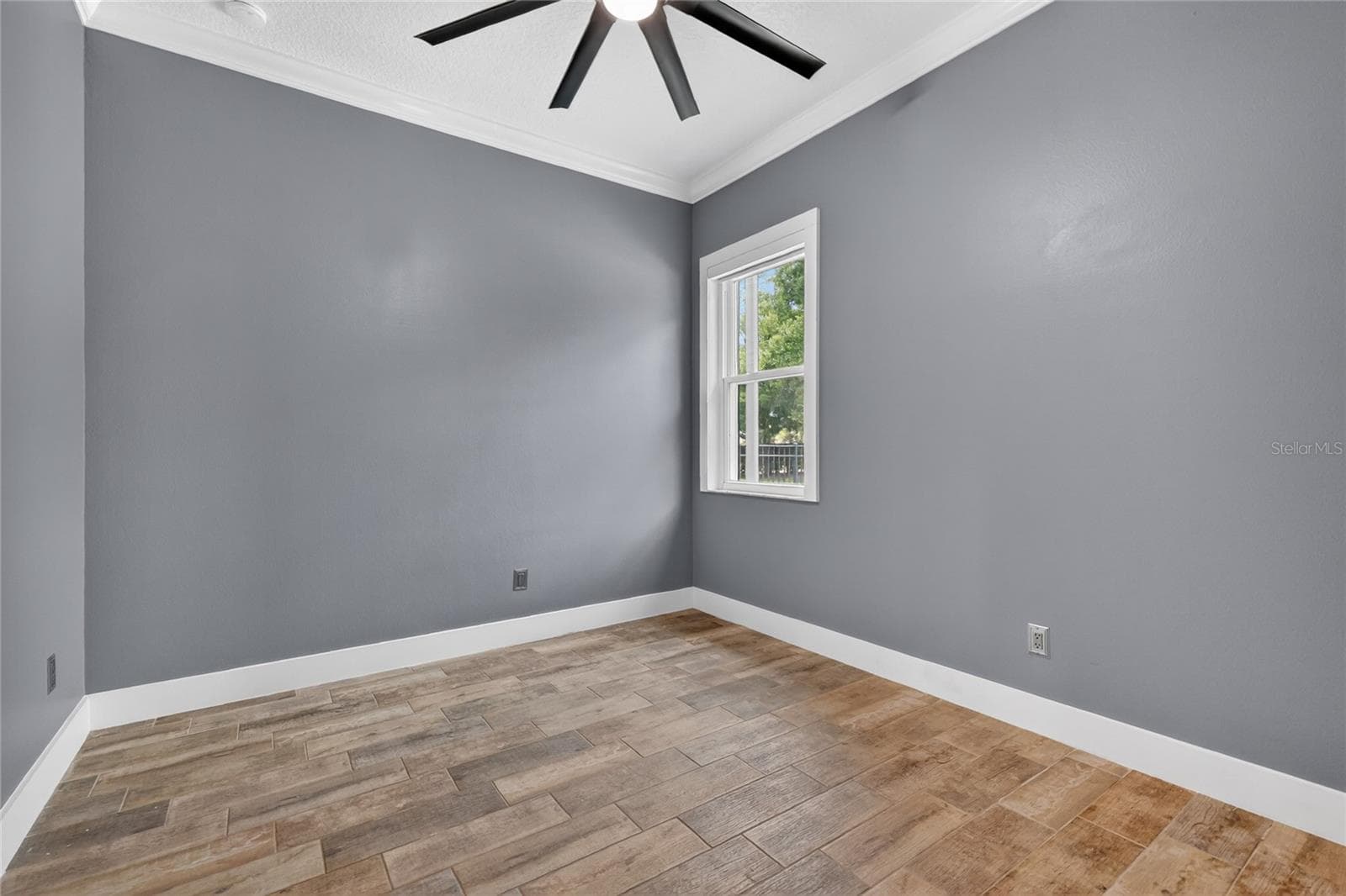 Bedroom 4 overlooks backyard, offers a walk-in closet - 5006 RISHLEY RUN WAY, MOUNT DORA