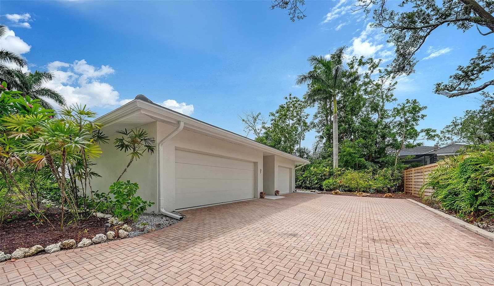 2 car garage plus 1 car garage with 1 air-conditioned bay - 1428 PINE BAY DR, SARASOTA