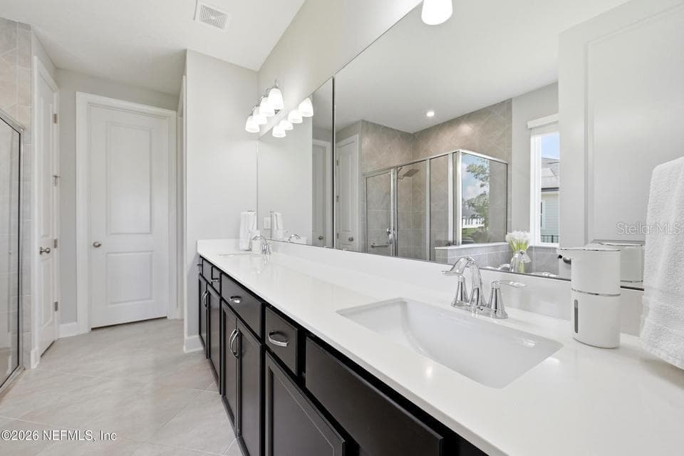 Downstairs Primary Bathroom - 128 WINDWALKER DR, ST AUGUSTINE