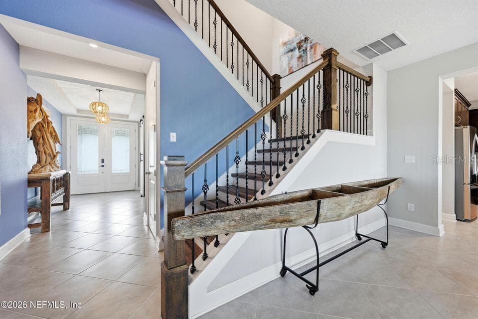 Foyer and stairs - 128 WINDWALKER DR, ST AUGUSTINE