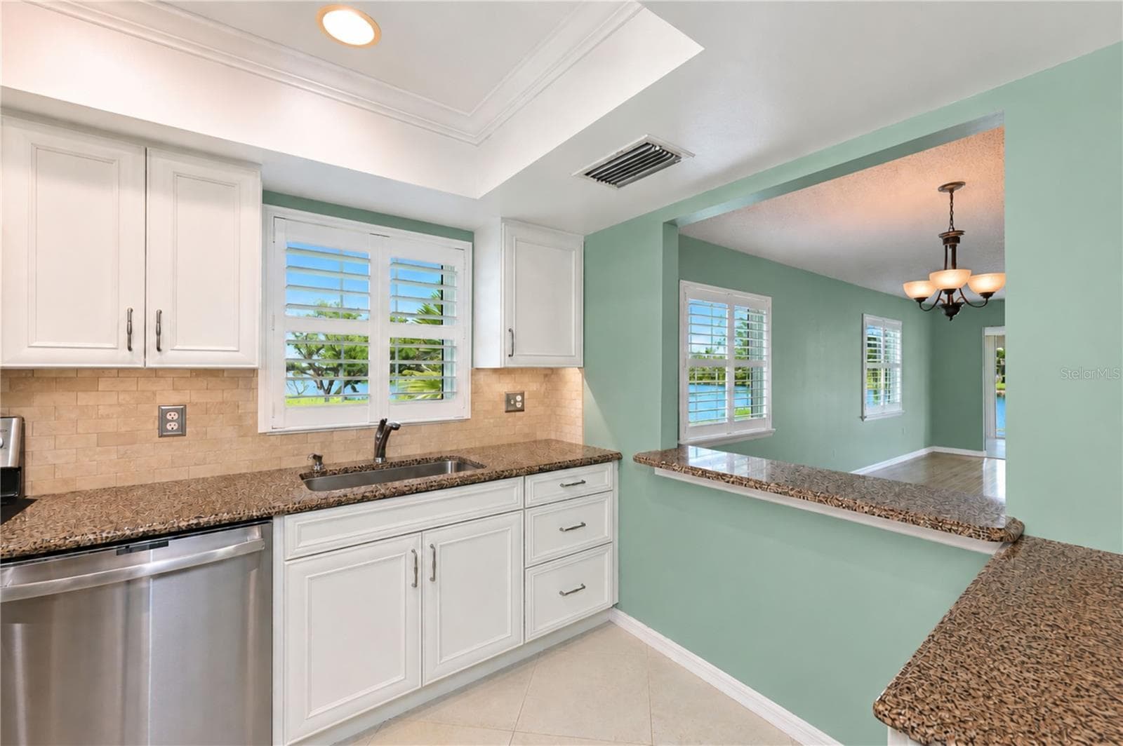 From kitchen entry - 9425 ANDOVER CIR, BRADENTON