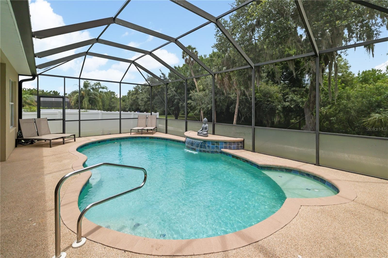 Tranquil oversized pool and undercover area for enjoying the year round Florida sunshine, rubberized pool deck surface for the the young ones enjoyment, heated pool - 12471 NATUREVIEW CIR, BRADENTON