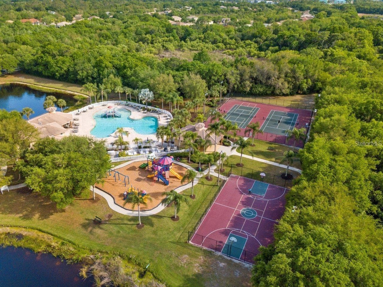 Community center East, splash pad for younger ones enjoyment, playground, basketball, tennis courts - 12471 NATUREVIEW CIR, BRADENTON