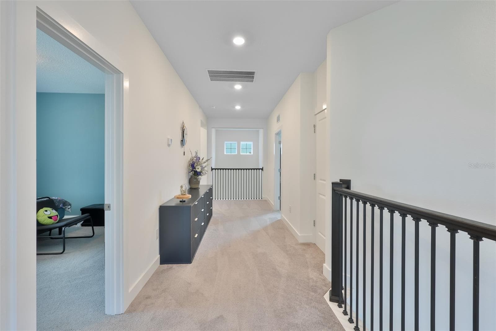 Hallway to guest bedrooms - 6107 GOLDEN BEACH DR, APOLLO BEACH