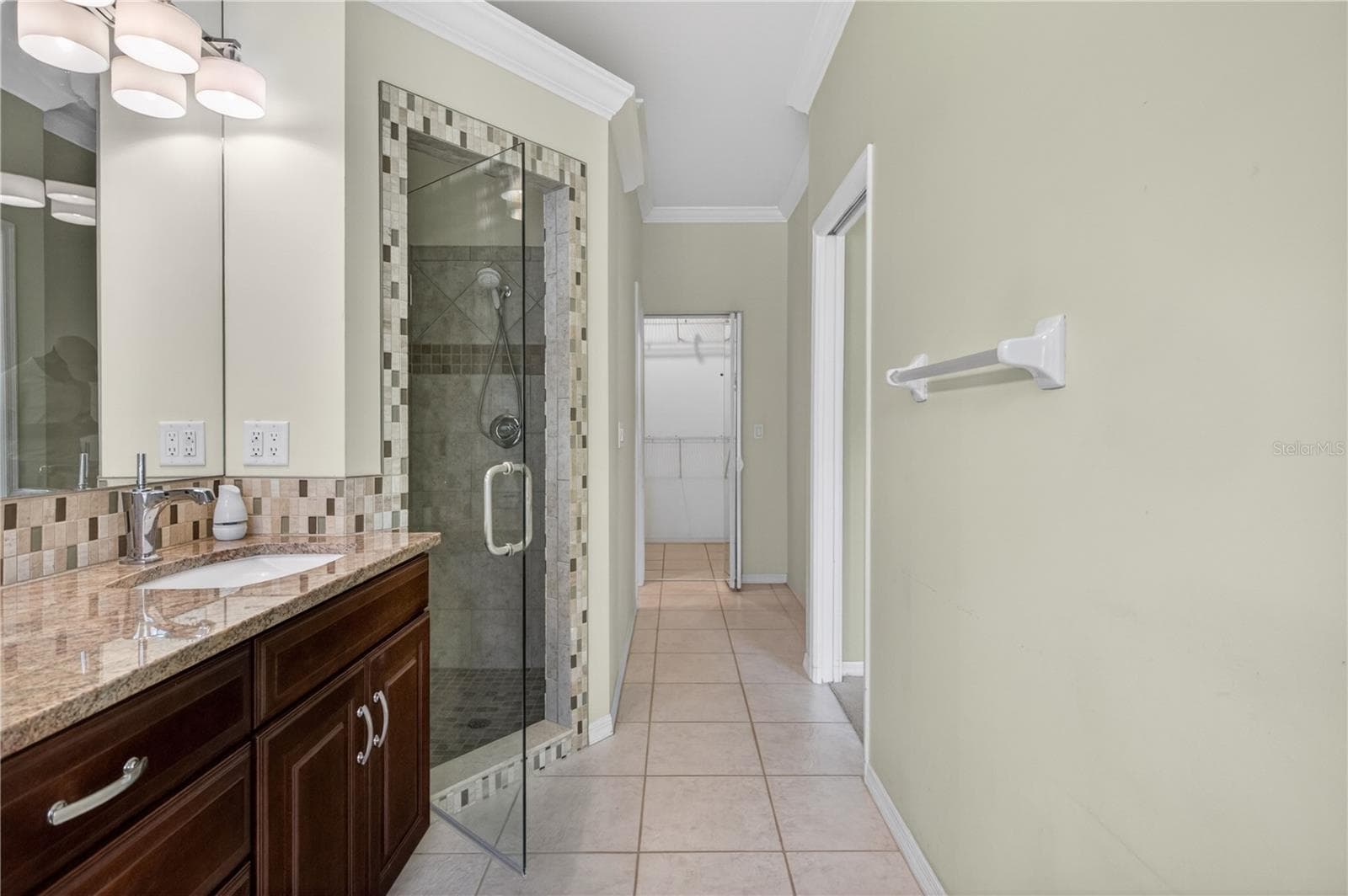 Primary bath extends with private toilet and large walk-in closet - 6948 STONEYWALK CT, BRADENTON