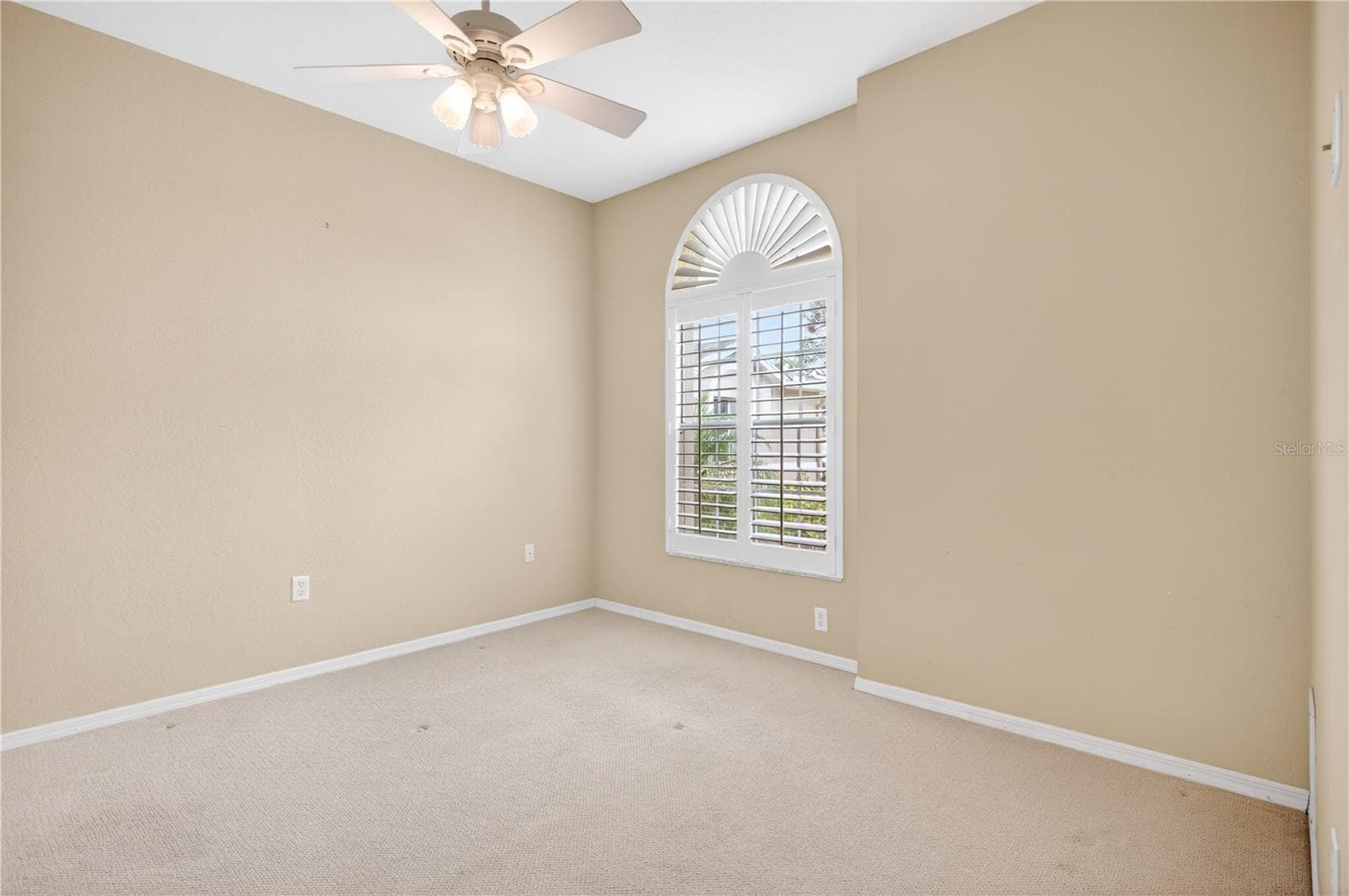 Bedroom two with West facing large sunlit window - 6948 STONEYWALK CT, BRADENTON