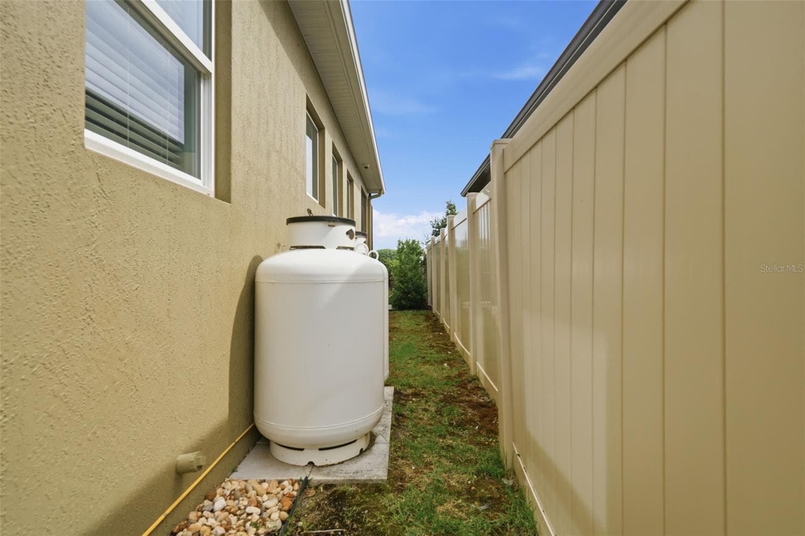 Gas tanks for home generator - 16716 ABBEY HILL CT, CLERMONT