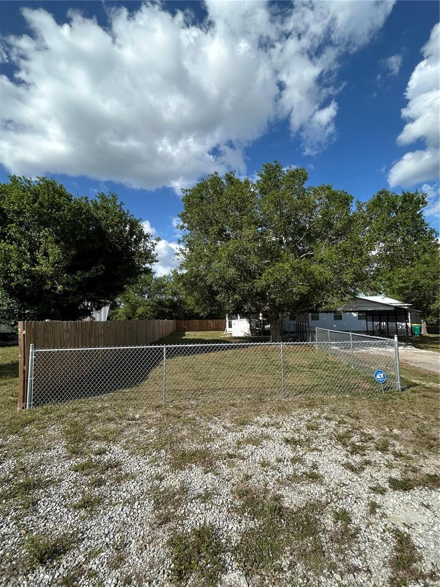 Fenced in area - 5522 SWAYING PALM, PUNTA GORDA