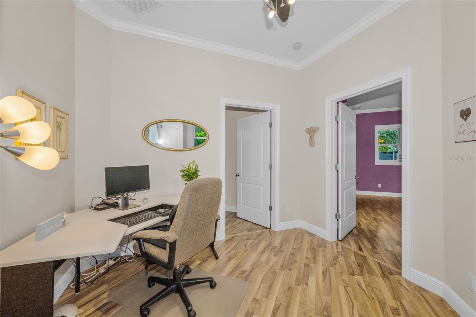 Bedroom 3 and 4 are adjacent to the office. - 1888 BUGLE LN, CLEARWATER