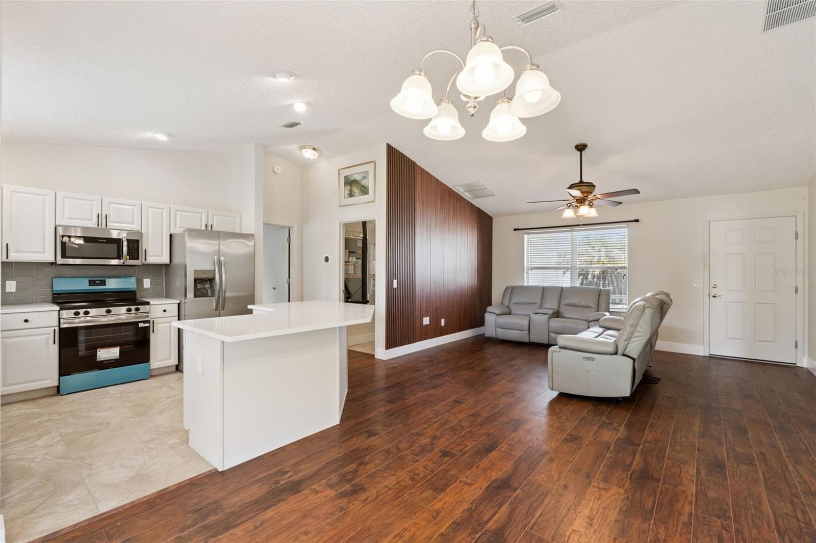 Living Room Open to Upgraded Kitchen - 1575 HOLLYBERRY PL, THE VILLAGES