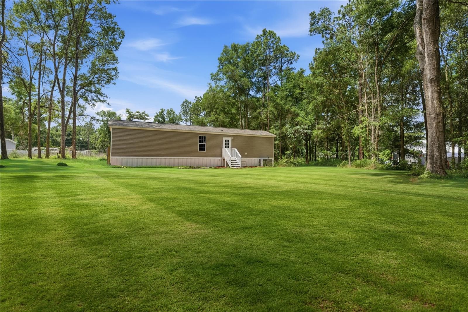 Manufactured Home at 11311 NW 13TH ST, OCALA, photo 21 of 24