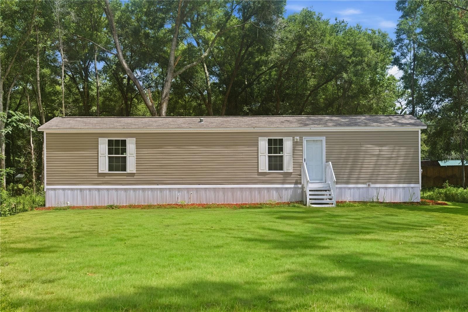 Manufactured Home at 11311 NW 13TH ST, OCALA, photo 23 of 24