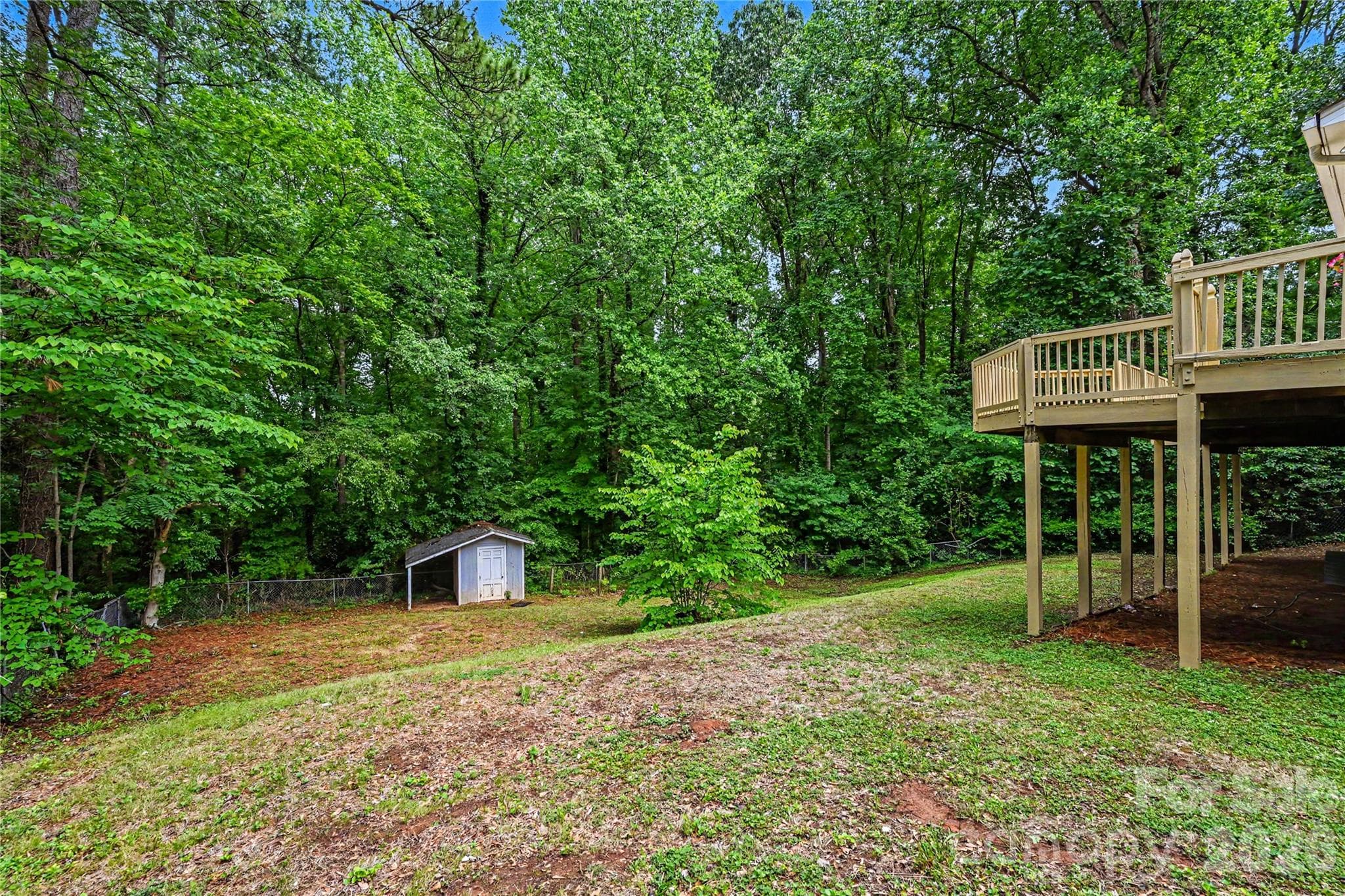 Enjoy the perfect balance of open yard space and wooded privacy on this spacious half acre lot. - Concord