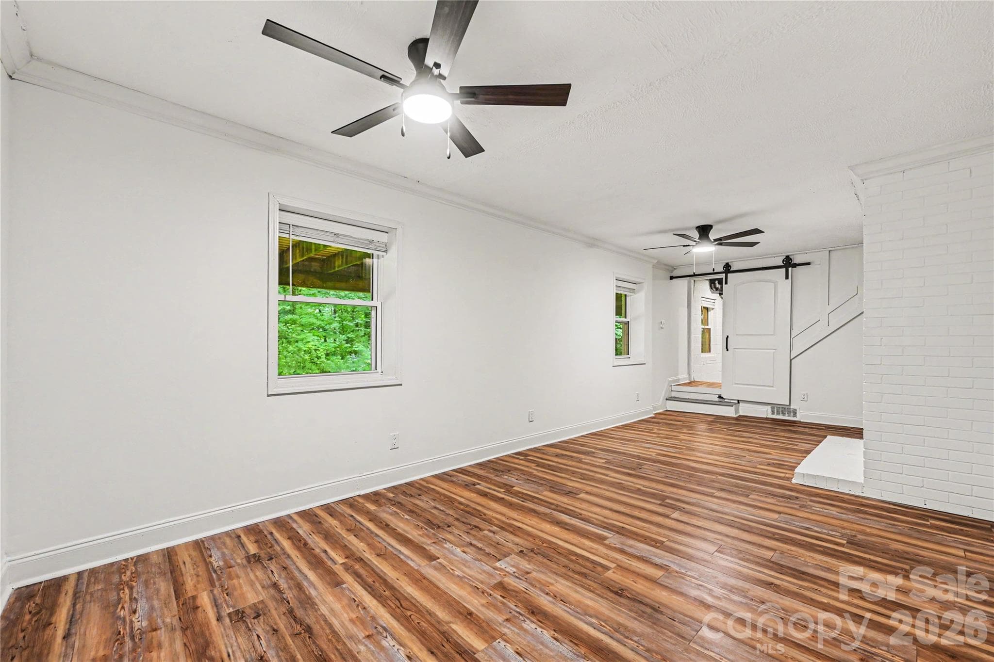 Expansive 312 square foot heated lower level space offering flexibility for work, play, hobbies, fitness, or additional living needs. - Concord