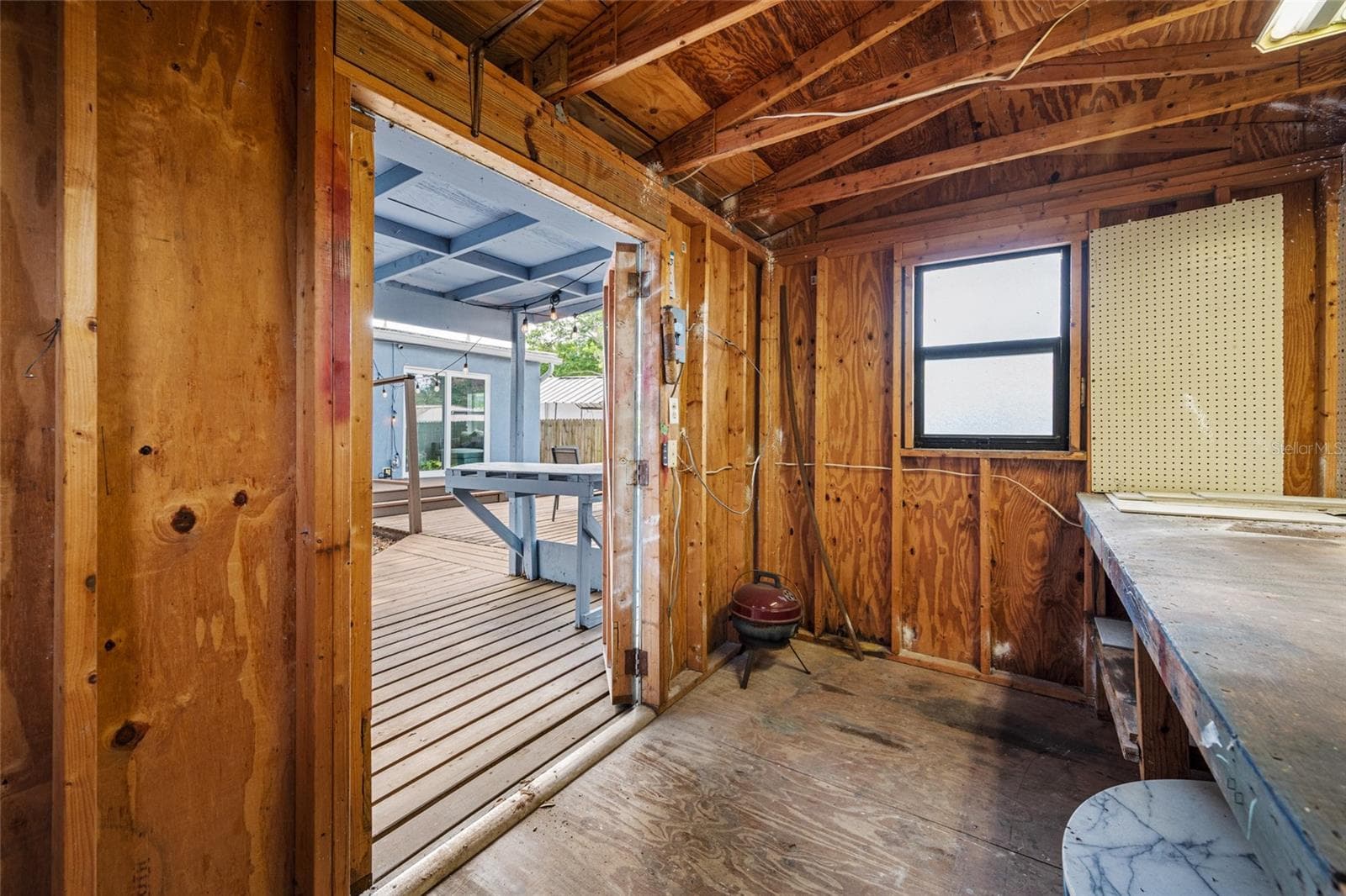 detached workshop with built in desk, perfect for projects and hobbies - 5044 BETTY ST N, ST PETERSBURG