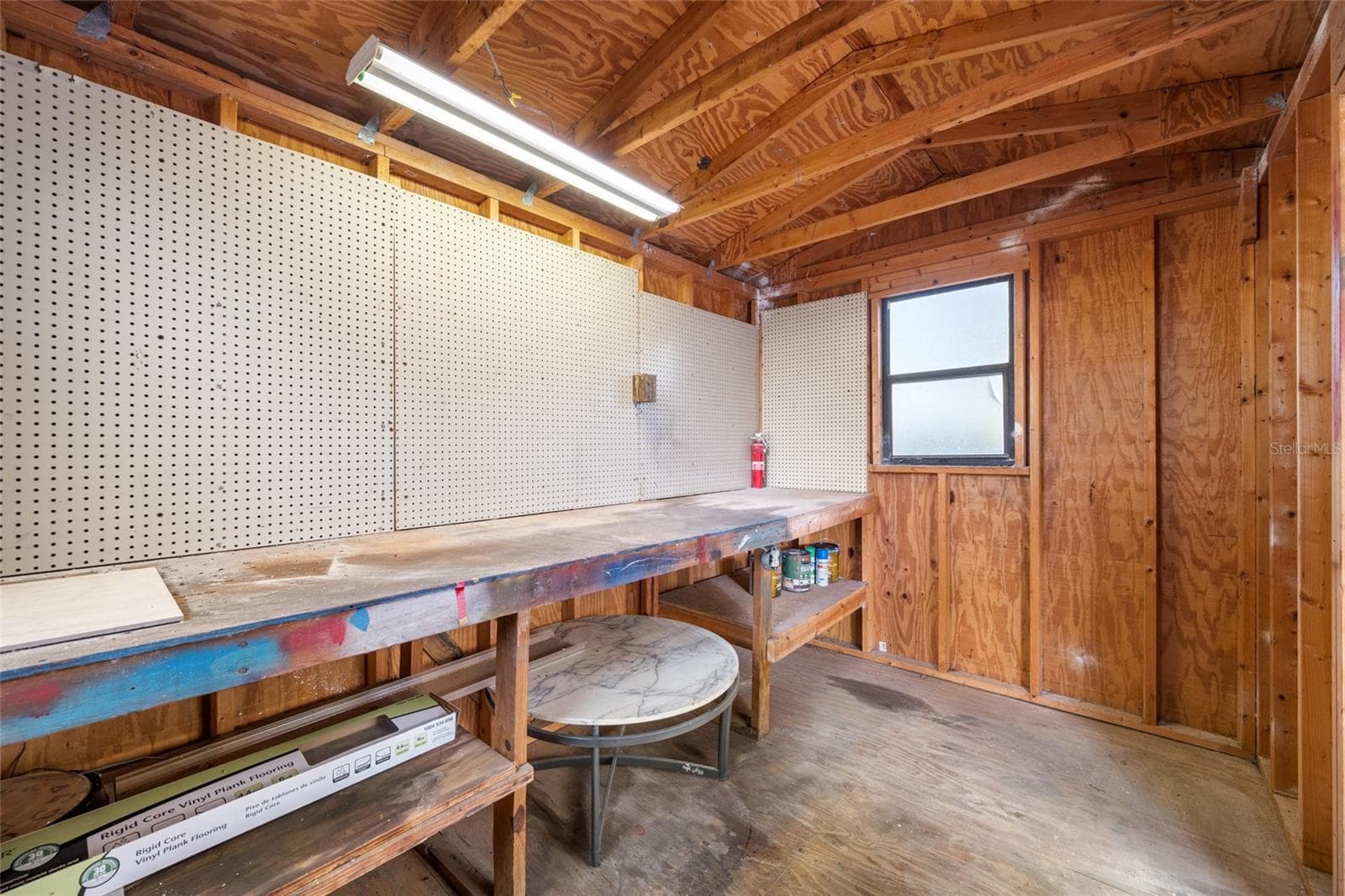 Detached workshop with built in desk, perfect for projects and hobbies - 5044 BETTY ST N, ST PETERSBURG