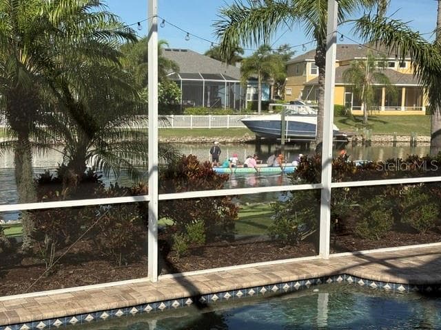 view from family room as rowing team goes by - 5318 LOON NEST CT, APOLLO BEACH