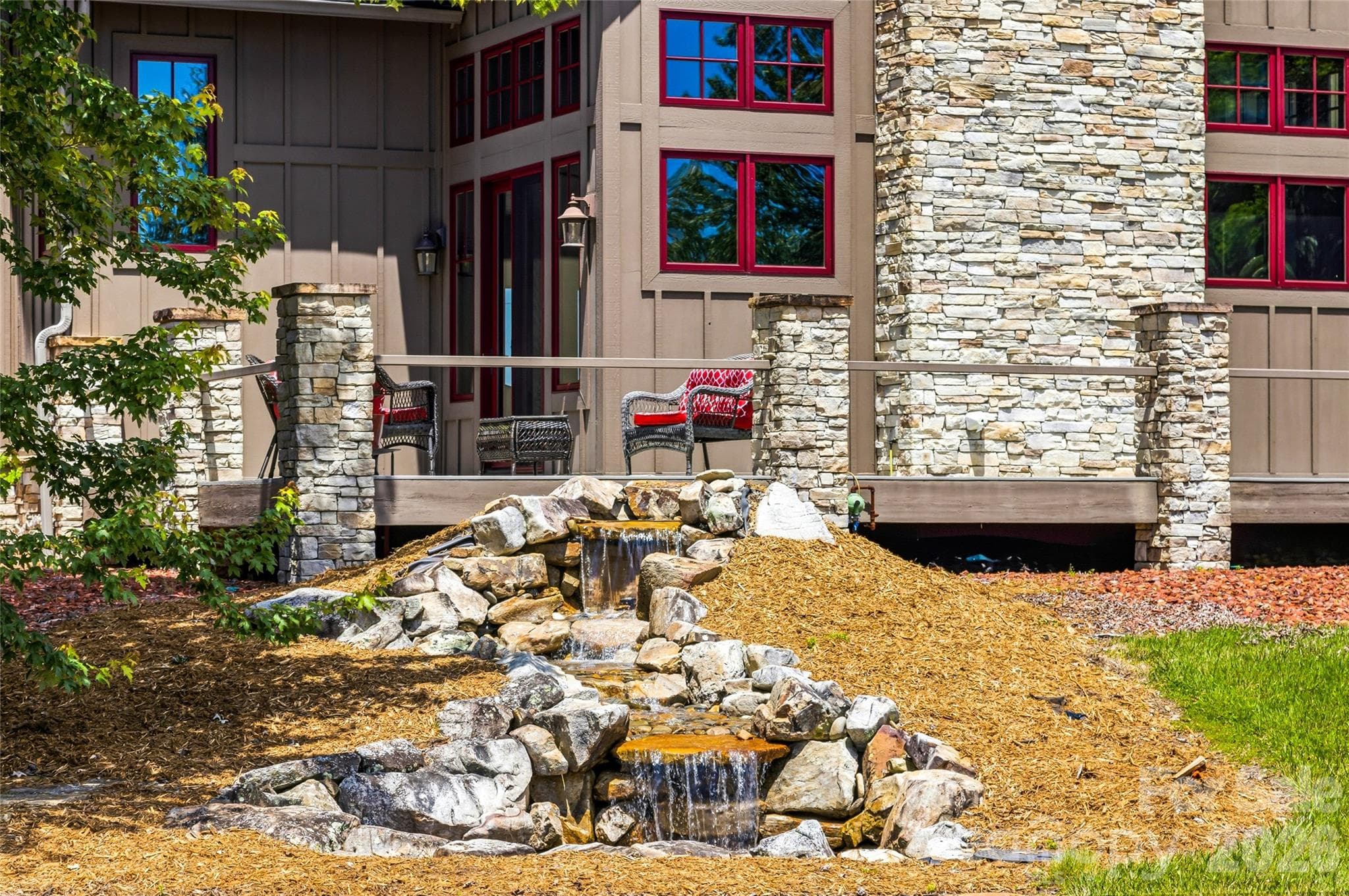 Waterfall adds ambiance to outdoor living space - 4862 Pinnacle Mountain Road, Zirconia