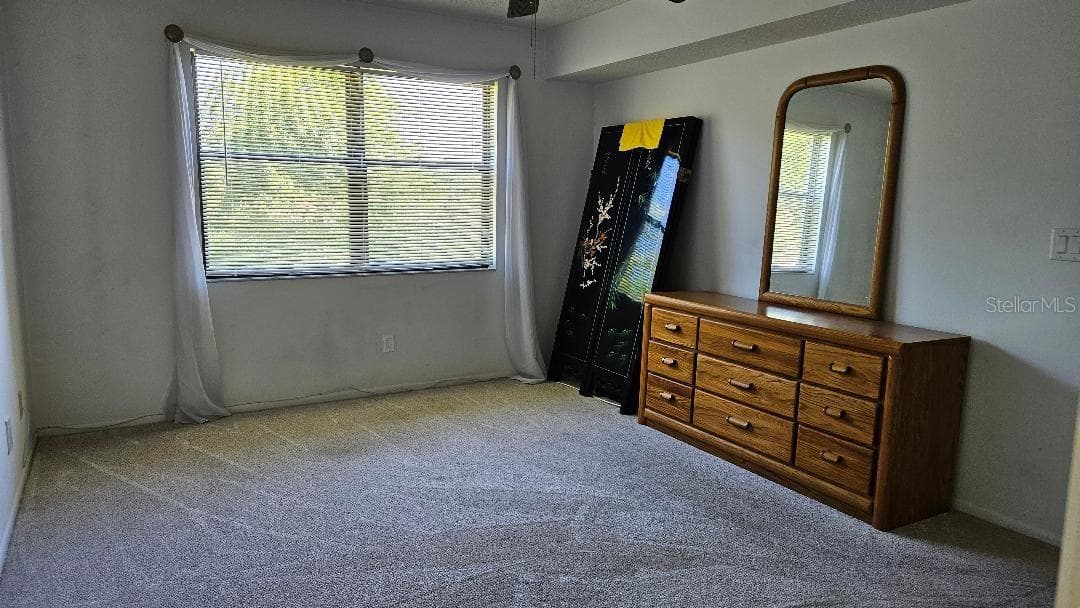 MAIN BEDROOM WITH BATHROOM AND WALK IN CLOSET - 5920 80TH ST N #308, ST PETERSBURG