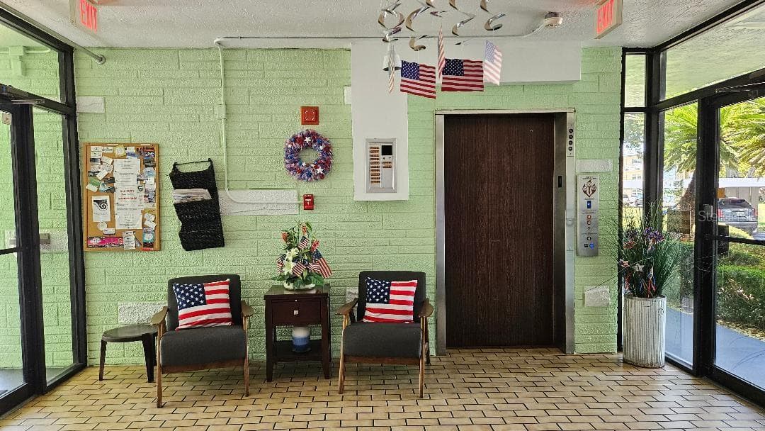 LOOKING FROM THE ELEVATOR IN THE LOBBY - 5920 80TH ST N #308, ST PETERSBURG