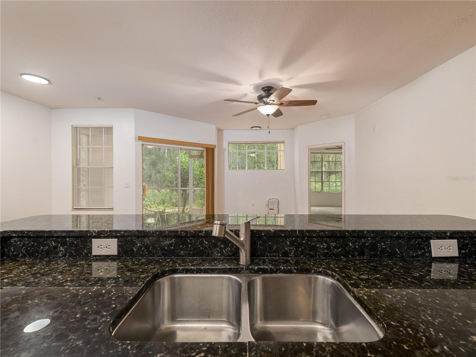 kitchen open to living area - 5125 PALM SPRINGS BLVD #7108, TAMPA