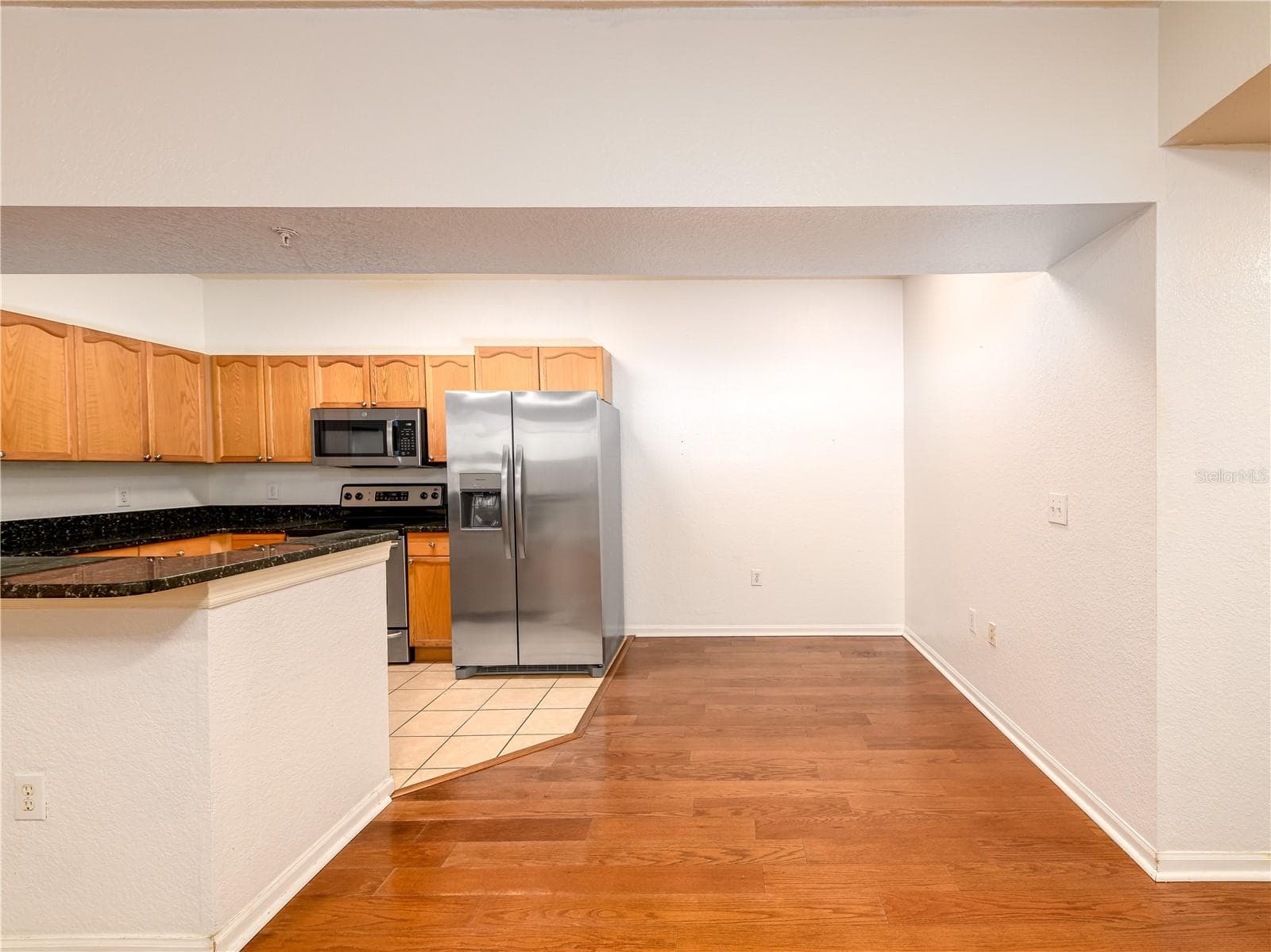 kitchen with dining area - 5125 PALM SPRINGS BLVD #7108, TAMPA